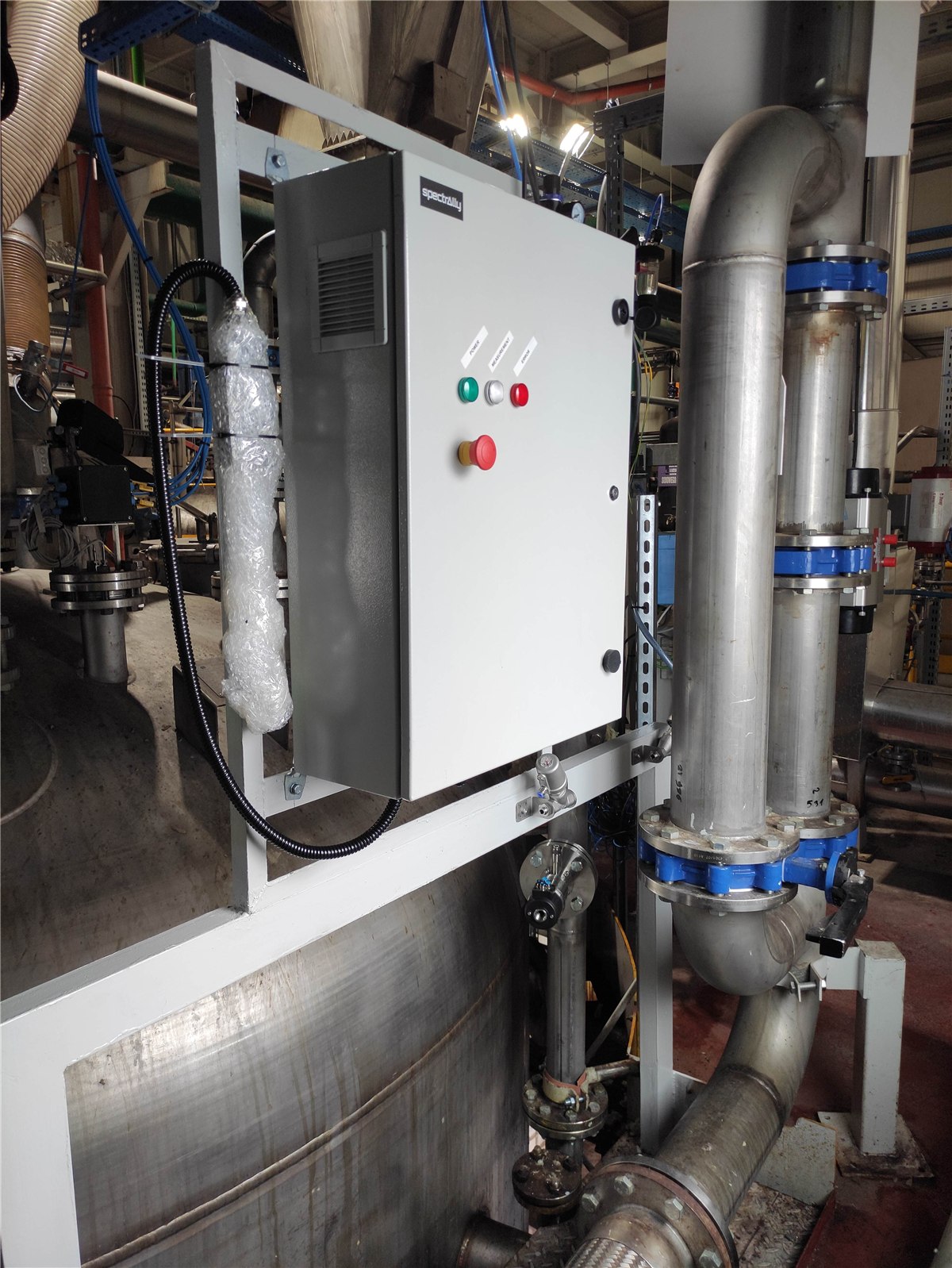 Spectrally X1 INLINE analyzer cabinet on an epoxy resin process line